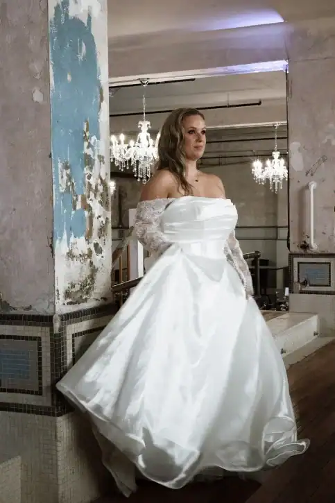 NHP Wedding Venue North Georgia bride picking up dress NHP Wedding Venue North Georgia bride picking up dress